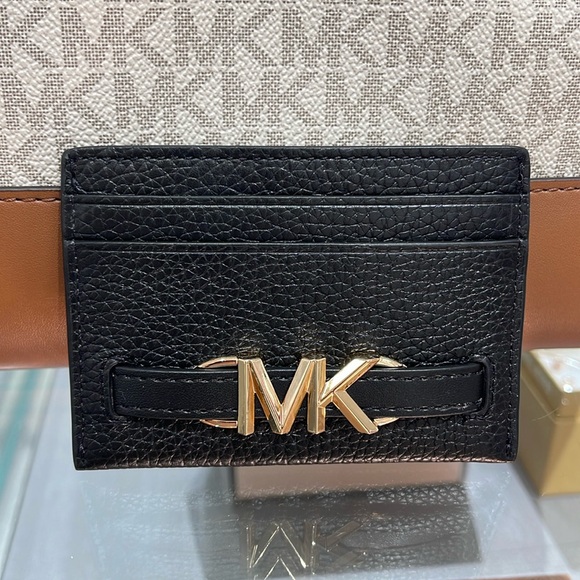 MICHAEL KORS
Reed Large Pebbled Leather Card Holder Case Wallet 
COLOR BLACK
NWT - Picture 1 of 16